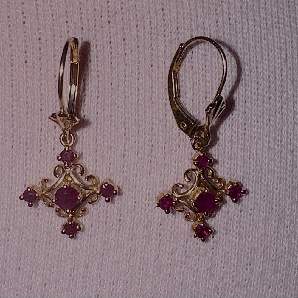 14k gold earrings with rubies.